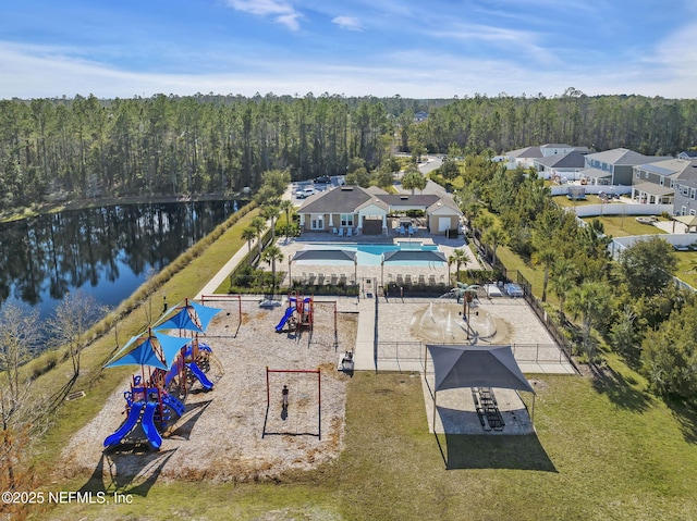 birds eye view of property featuring a water view