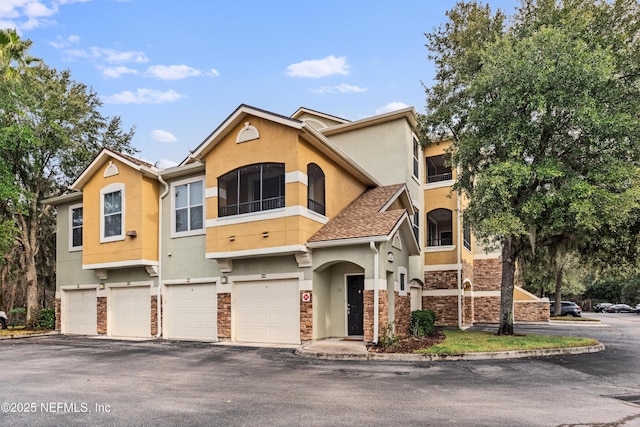 view of property with a garage