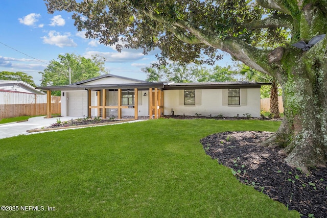 ranch-style house with a garage and a front yard