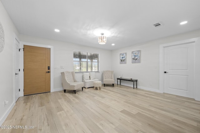 living area featuring light hardwood / wood-style floors