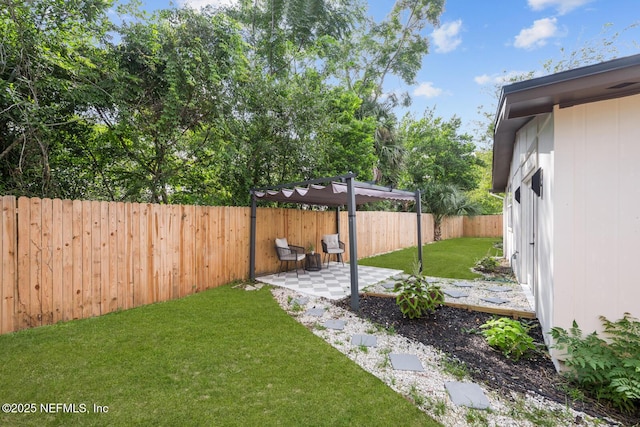 view of yard with a patio and a pergola