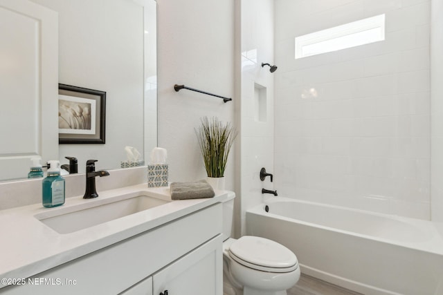 full bathroom with toilet,  shower combination, and vanity