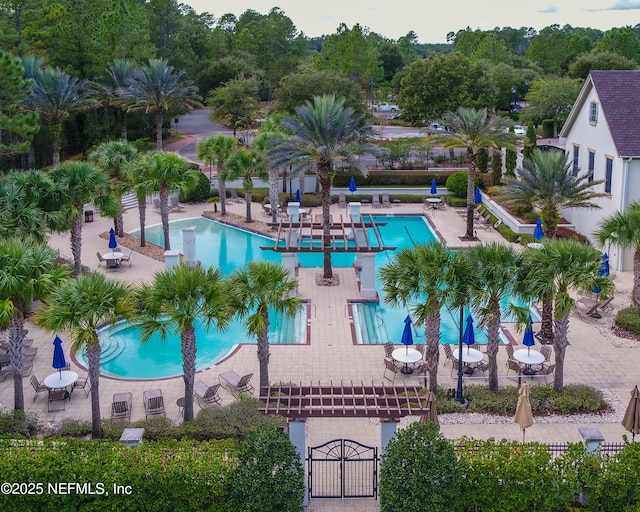 view of pool featuring a patio area