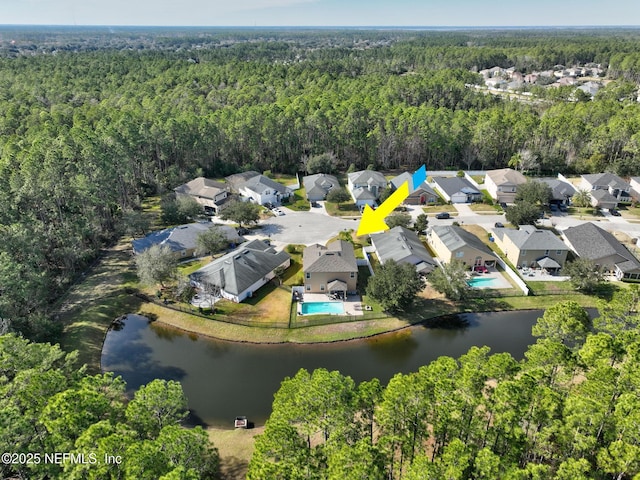 aerial view with a residential view and a forest view