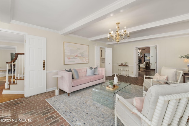 living room featuring crown molding, a notable chandelier, and beam ceiling