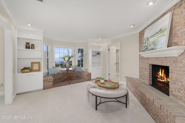 carpeted living room featuring crown molding, a fireplace, and built in features