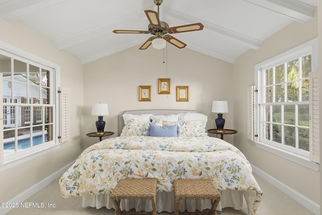 bedroom with vaulted ceiling with beams, ceiling fan, and carpet flooring