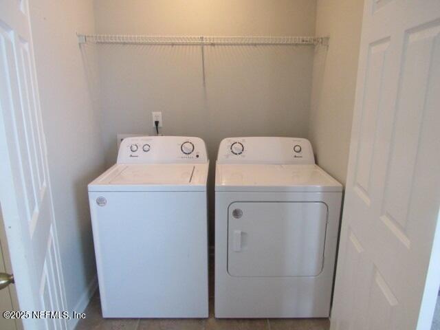 laundry area featuring separate washer and dryer