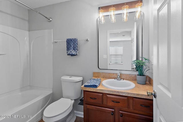 full bathroom with shower / tub combination, vanity, and toilet