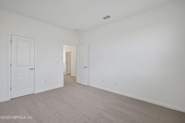 unfurnished bedroom with light carpet