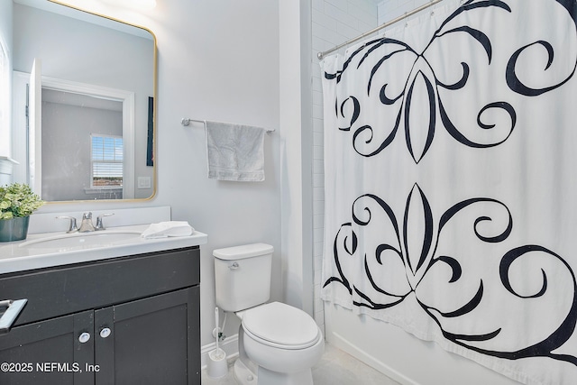 full bathroom featuring vanity, toilet, and shower / bath combo