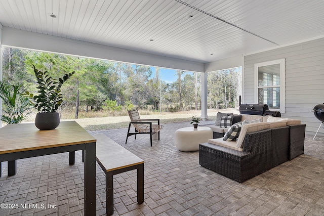 view of patio / terrace with a grill and outdoor lounge area