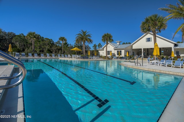 view of swimming pool featuring a patio area