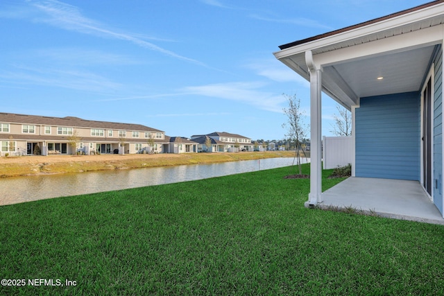 view of yard with a water view