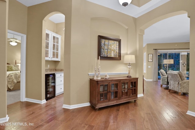 interior space featuring light hardwood / wood-style floors and beverage cooler