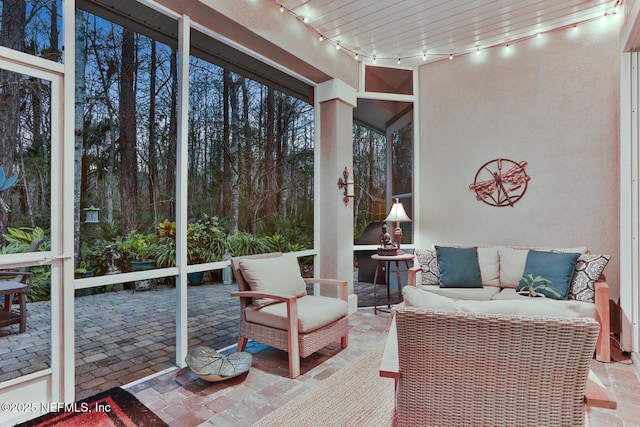 sunroom with rail lighting