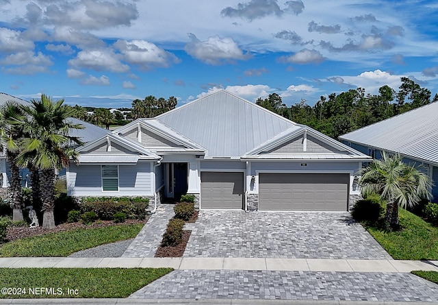 view of front of property featuring a garage