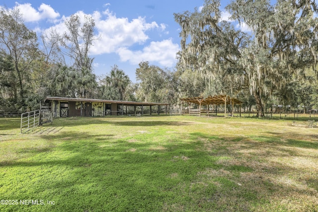 view of home's community with an outdoor structure