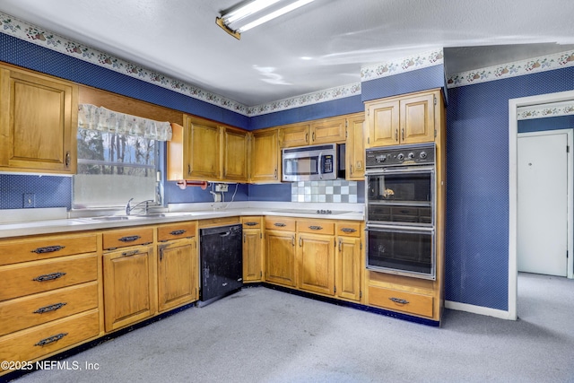 kitchen with light carpet, sink, and black appliances