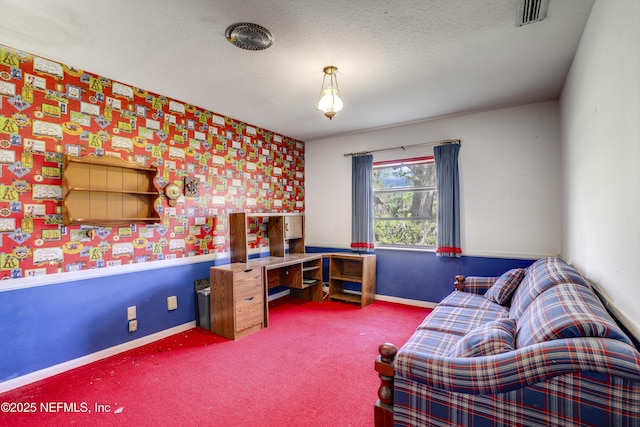 office space with carpet and a textured ceiling