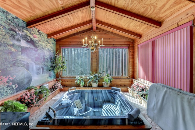 sunroom featuring lofted ceiling with beams, wooden ceiling, an inviting chandelier, and a jacuzzi