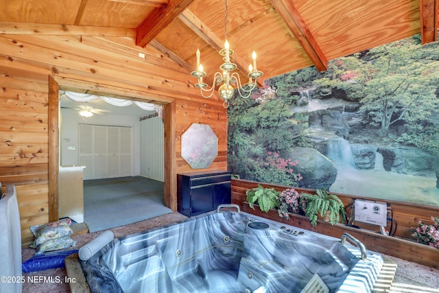 bedroom featuring vaulted ceiling with beams, wood ceiling, a chandelier, and wood walls