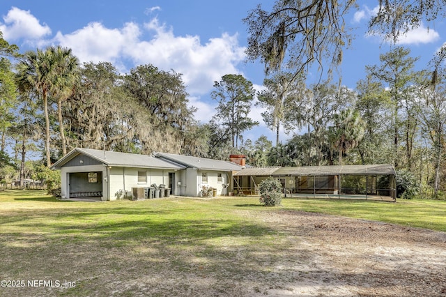 ranch-style home featuring a front yard