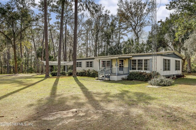 view of front of home with a front lawn