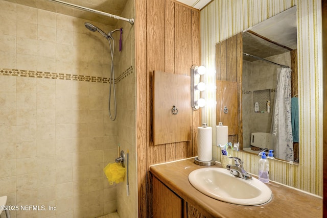 bathroom with vanity and walk in shower