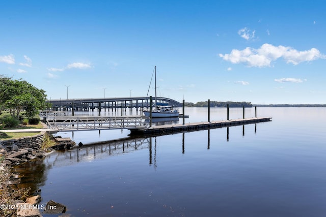 dock area featuring a water view