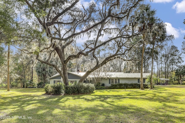 ranch-style house with a front yard