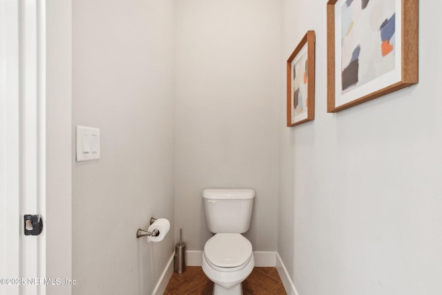 bathroom featuring toilet