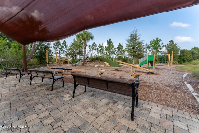 view of patio with a playground