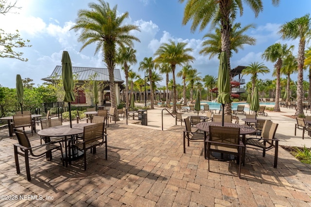 view of patio featuring a community pool