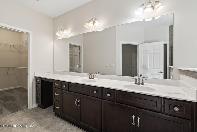 bathroom with vanity and tile patterned floors