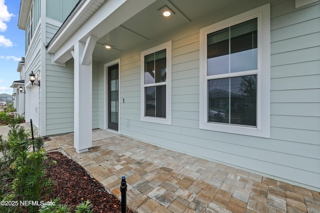 view of patio / terrace with a garage