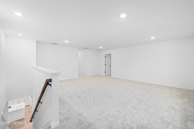 basement with light colored carpet