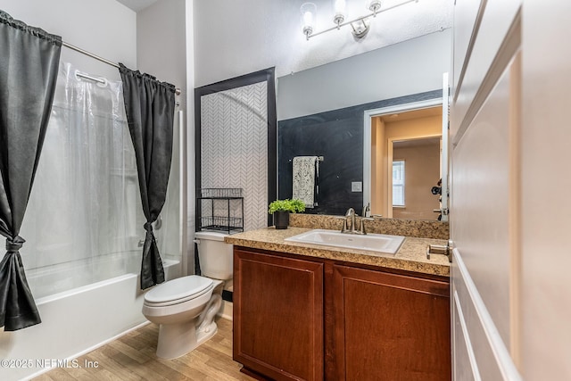 full bathroom with hardwood / wood-style flooring, toilet, vanity, and shower / bathtub combination with curtain