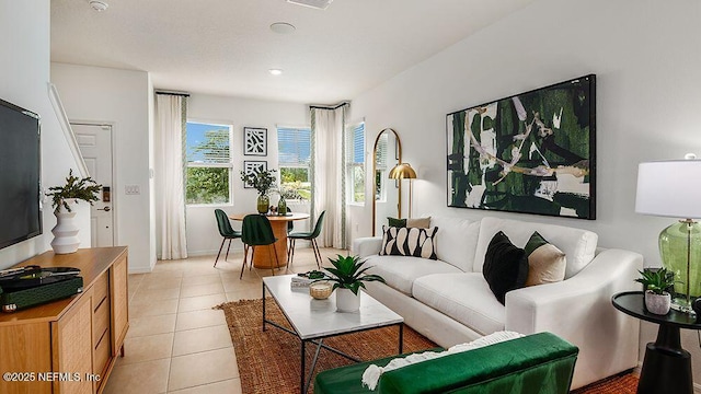 living room with light tile patterned floors