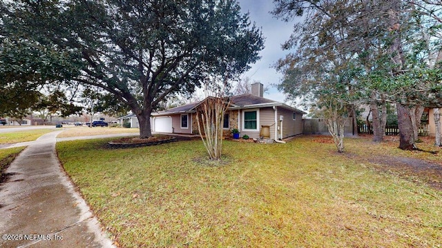 view of front of home with a front lawn