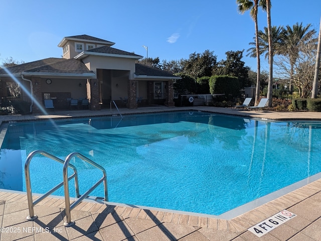 view of pool with a patio area