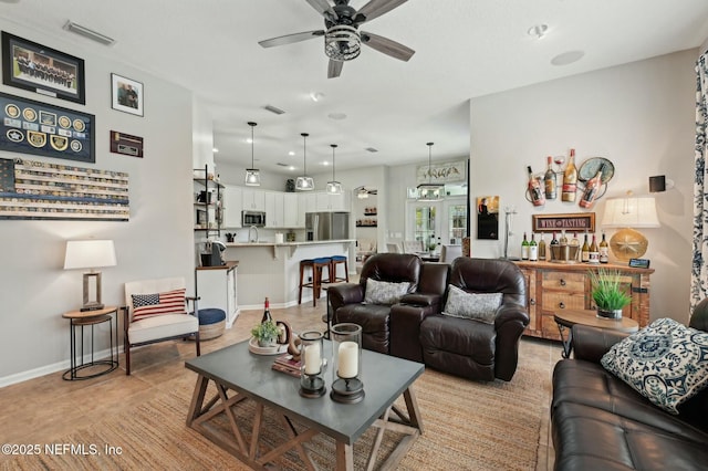 living room featuring ceiling fan