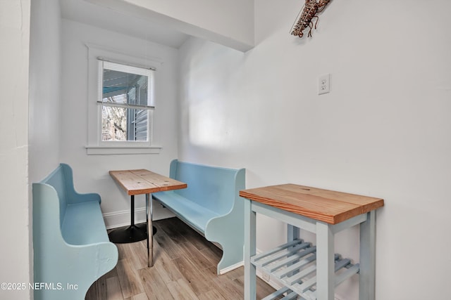 sitting room with hardwood / wood-style flooring