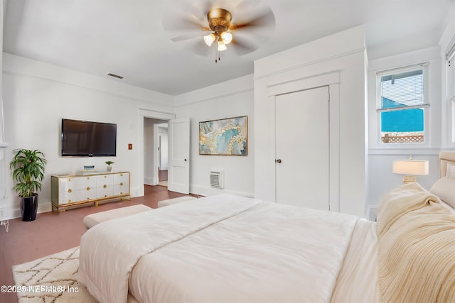 bedroom with a closet and ceiling fan