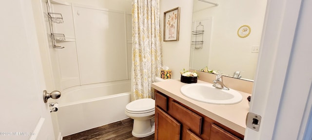 full bathroom featuring wood-type flooring, toilet, vanity, and shower / bath combo