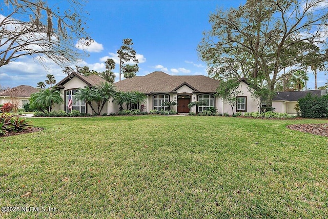 view of front of home with a front yard