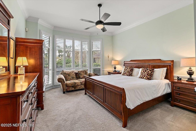 bedroom with ceiling fan, crown molding, and light carpet