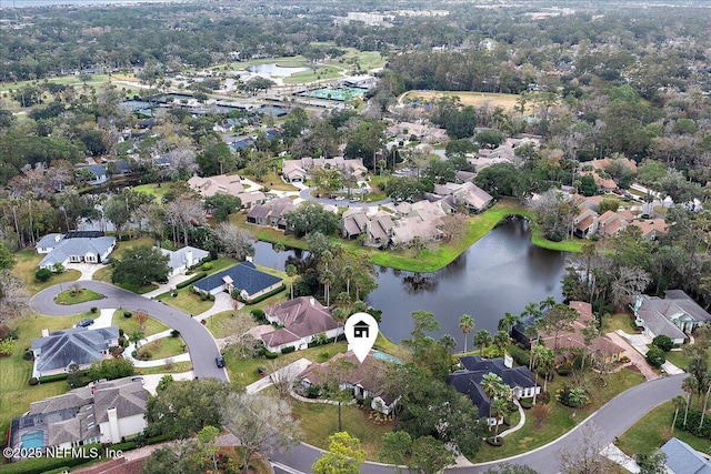 drone / aerial view with a water view