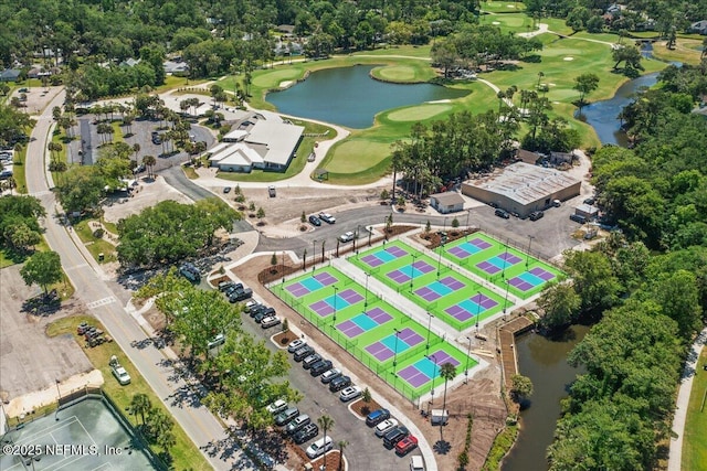 birds eye view of property with a water view