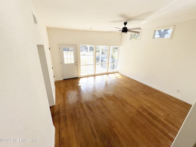 interior space with hardwood / wood-style flooring and ceiling fan